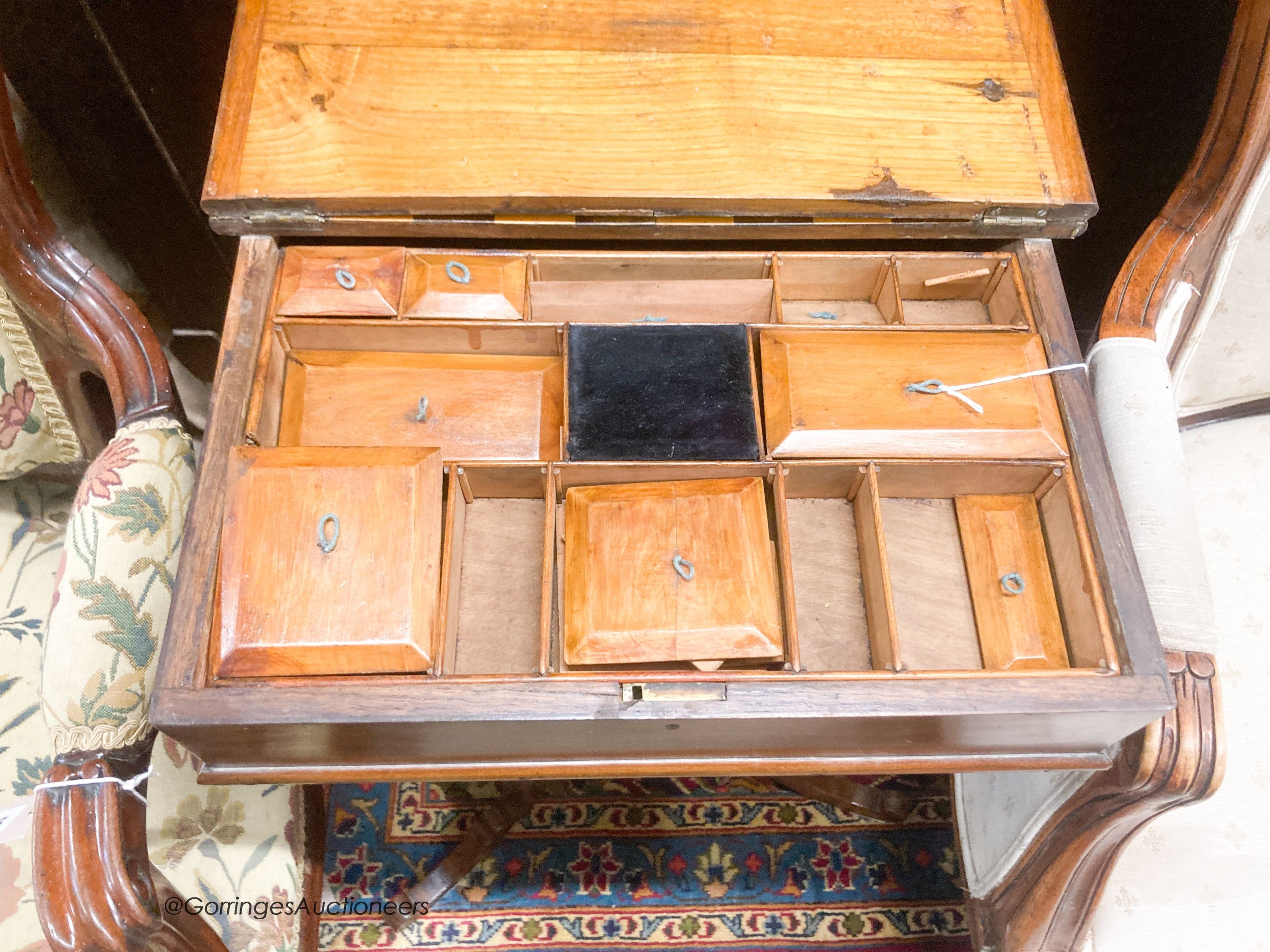 A mahogany games table, width 40cm, depth 40cm, height 74cm